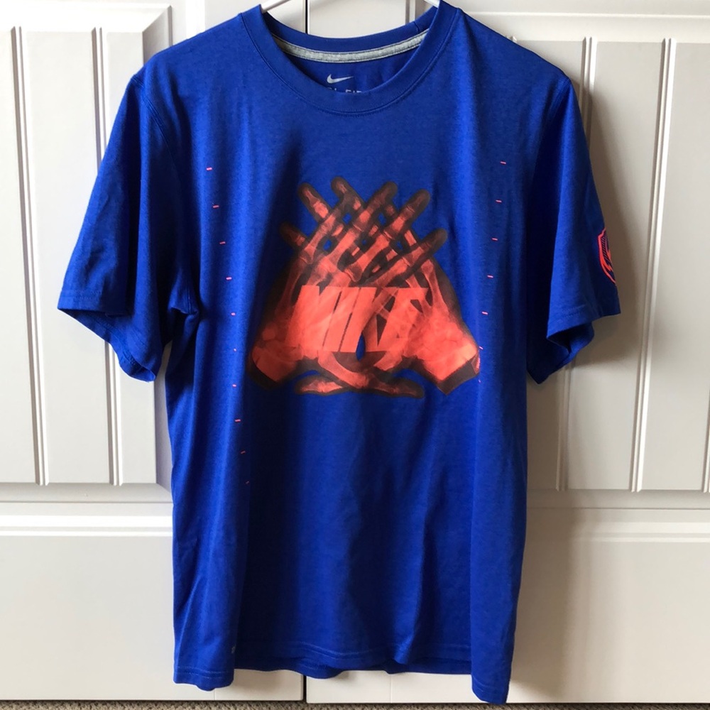 Nike Dri-Fit blue t shirt with orange hands